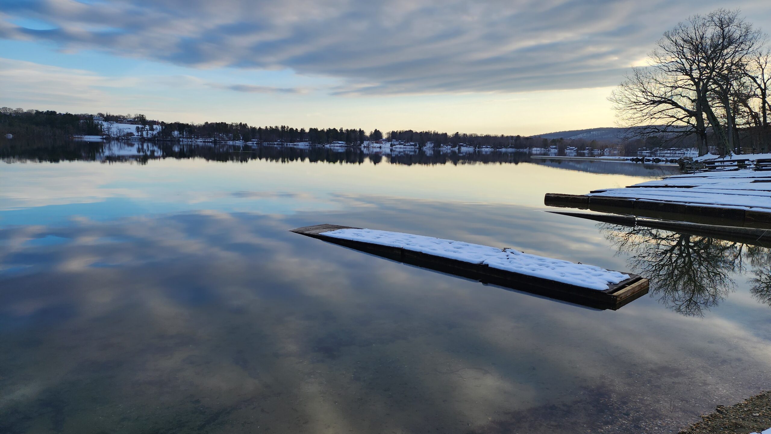 Magnet Fishing by a dock on a lake